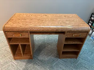 Beautiful wood desk in good condition one little used spot easy to fix lots of storage areas