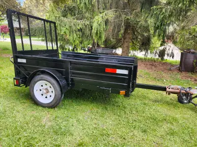Utility Trailer 4x6, extend to 4x8. Removable sides to become flat bed trailer, also it is a dump tr...
