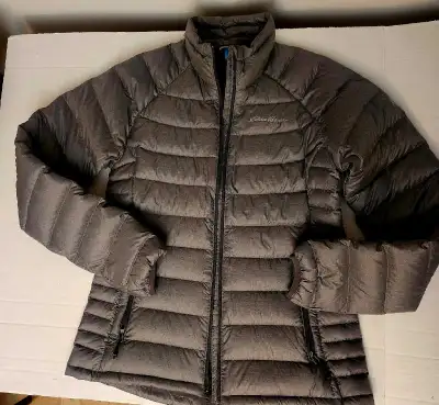 Snuggle up in this charcoal-grey Eddie Bauer down-filled puffer jacket, size extra-small! It's in gr...