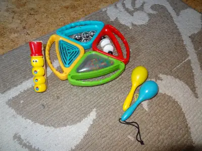 --percussion musical instruments/toys for young children --the 4 triangles of different percussions...