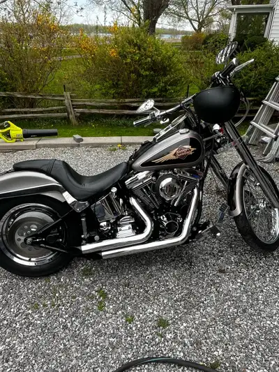 1996 Harley Davidson Softail Springer with modified front forks for sale. Low KMs. In great conditio...