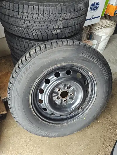 Bridgestone Blizzak WS90 (225/65R16) Set of 4 on steel rims Used 2 seasons on 2023 Crosstrek Nearly...