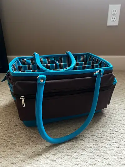 This brown and turquoise craft caddy is perfect for keeping all your supplies organized and easily a...