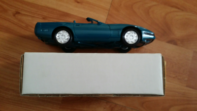 New Boxed ERTL 1994 Corvette Convertible in Bright Aqua Metallic.I do not ship