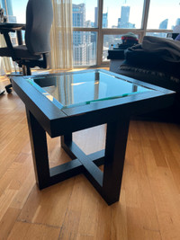 $20 Glass-top coffee table (832 Bay St, May 25-31)