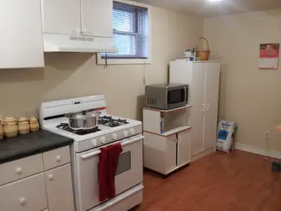 1 bedroom basement apt, located in a residential area, triplex building close to bank and heron. All...