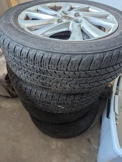 Firestone 205/55R16. Plenty of life left in them, I no longer have the car and need to get them out...