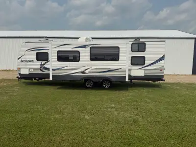 This is a 2013 Springdale 30’ bumper pull camper. This unit is in very good condition! It was at a s...