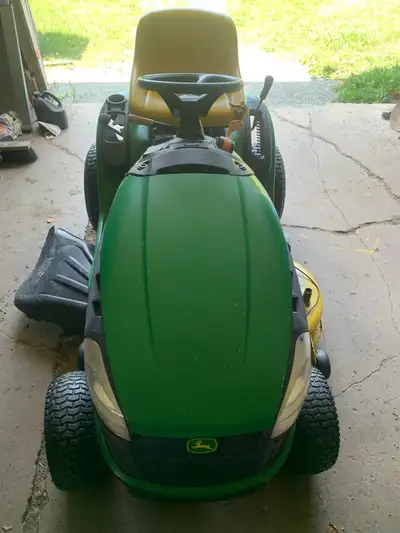 John Deere lawn tractor 17.5 hp 42” cut automatic. $1,500, View more
