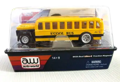 AUTO WORLD HO SLOT CAR ... "SCOOLBUS"... In plastic cube, never been opened.. Excellent condition Lo...