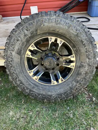 Tire and rim Rim: Ultra Motorsports 234-235 Maverick Gloss Black with Diamond Cut Accents [ 8 lug ]...