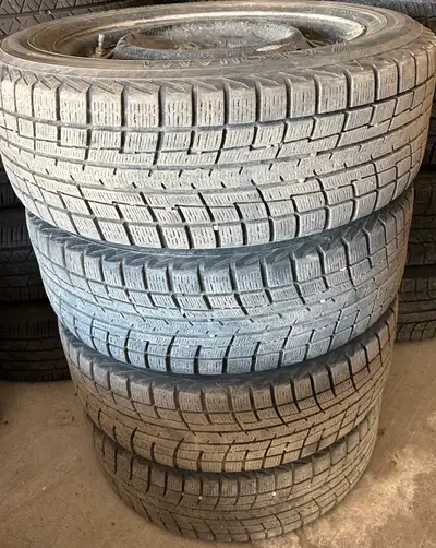 Off a Mitsubishi Lancer Size: 205/60R16 Center Bore: 67.1 mm Bolt Pattern: 5x114.3 Tire Depth: 9/32n...