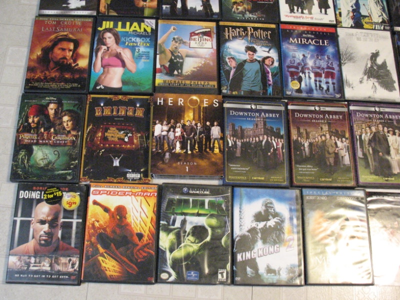 FREE DVD Player with 70 Cds and 50 DVDs CDs, DVDs & Bluray City of