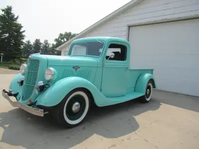 1935 Ford pickup street rod , 350 motor Edelbrock intake and carb., 350 trans., tubular front end wi...