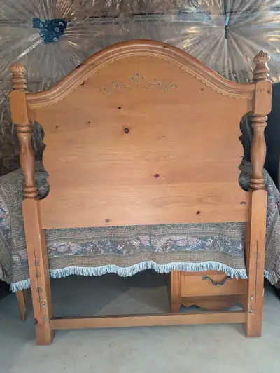 Selling a solid pine headboard complete with bed rails. This classic and sturdy piece adds warmth an...
