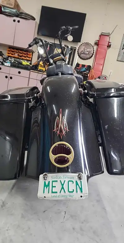 2009 Crossbones bagger, redesigned from a bobber look to a bagger look , Azkikr bags and fender made...