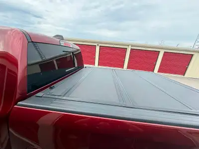 Tonneau cover back flip brand good shape works great no leaks hardware all there
