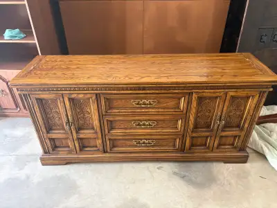 180$ 70 inch by 19 inch (32 inch high) Beautiful used vintage solid wood dresser with ornate detaili...