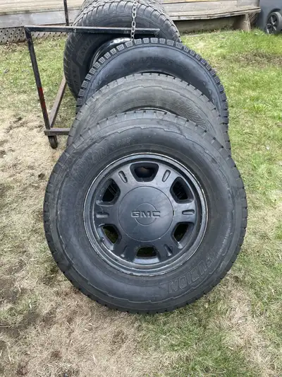 Selling a set of 4 summer truck tires on GMC/Chevy 6 bolt rims Size is 245/70R16 Rims are 6x139.7mm...