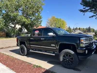 ‘17 HighCountry 1500 6.2L with 6” lift sitting on 35” Open Country A/T’s. 2 in spaced. 220,000km. Al...