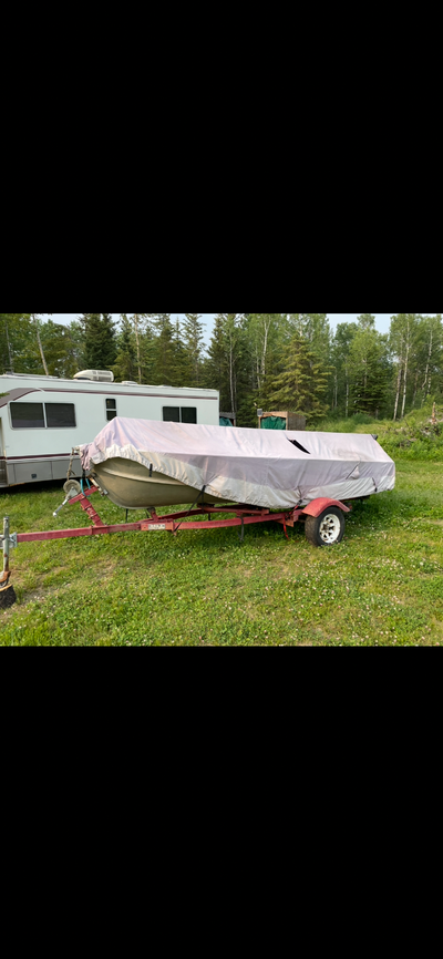 16 foot Aluminum, 3 bench seats with 2 vinyl padded seats with backrests . On a good roller trailer...