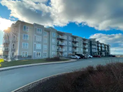Spacious first floor unit featuring two bedrooms, including a master bedroom with a large walk-in cl...