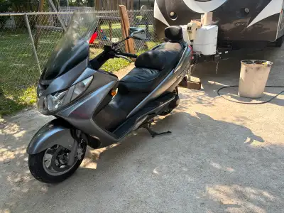 Fresh safety. 06 Burgman 400. Under 20000km on it. New Pirelli tires, fresh oil change. Drives nice....