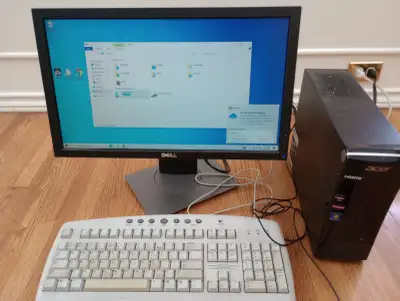 A set of Acer Desktop, View more