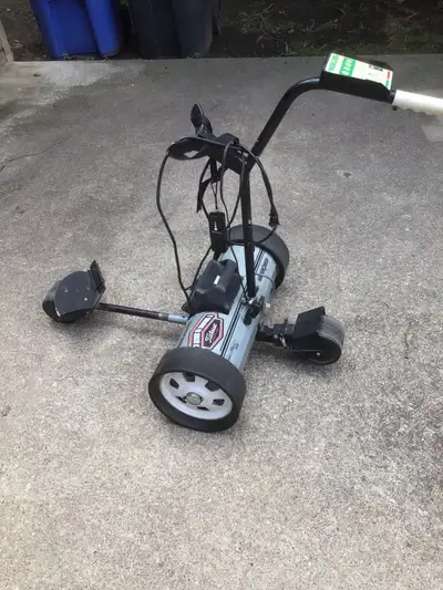 This pre-owned Electronic Kaddy Dyna-Steer 2000 is a reliable electric golf caddy design . . This un...