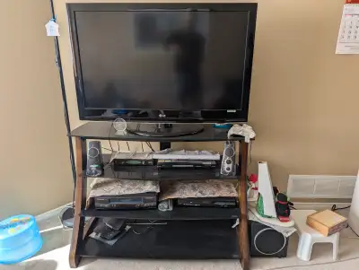 LG LCD/Model#42LH30 for $40 in Very new conditon Tampered Class Wood TV Stand for $40 in VERY GOOD c...