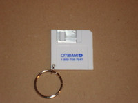 Keychain in the shape of a computer disk