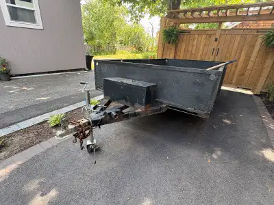 6 x 10 Heavy duty utility trailer. Steel subframe and box. Truck axle and tires. LED lights. Fits 10...