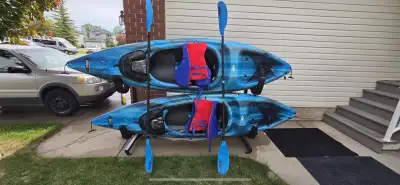 2 kayaks, paddles, life jackets and the double storage unit as seen in the photos. $800 OBO Delivery...