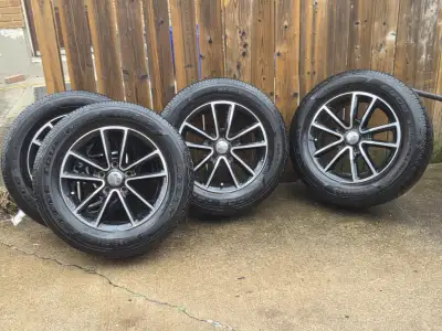 Set of 4 Kelly all season tires. Need dusting off but like new condition. Tread depth 80%. Factory D...