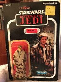 Vintage Star Wars Han Solo in trench coat on opened card 