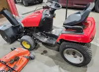 Ride on mower with snow blower