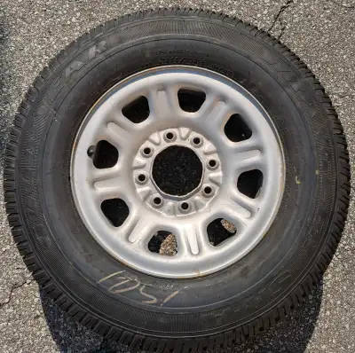 One Goodyear Wrangler SR-A LT 265/70R18 All Season Tire brand new on the rim. 8 bolts. Pick up only...
