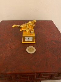 Brass miniature goal keeper quartz clock.