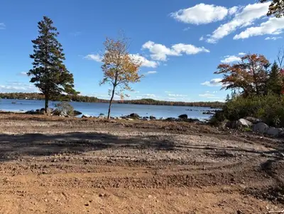 Cozy one bedroom, one bath tiny home right on the lake. Includes washer, dryer, dishwasher and heat...