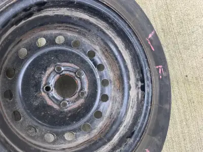Set of four snow tires on rims in good condition. Bolt pattern is 5x110 came off Chevy cobalt.