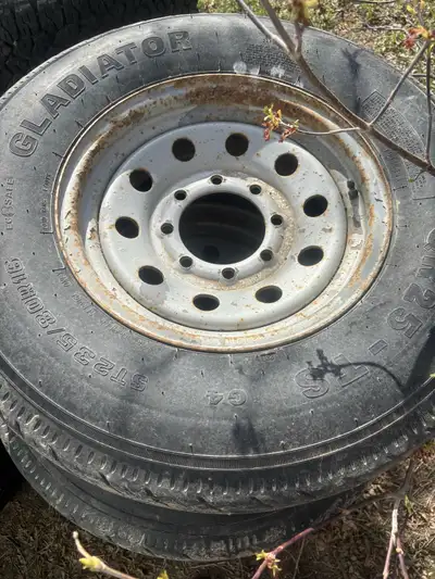 235/80r16 trailer tires Tires have some tread all hold air Good spares 8 bolt steel trailer rims $20...