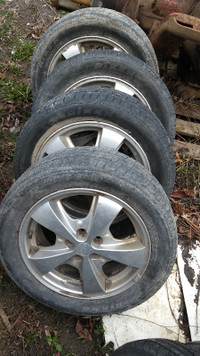 4 Tires/rims from 01-z24 cavalier, rims good shape.