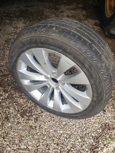 We have a good Continental tire on rim - would work great as a spare rather than using a donut. Tire...
