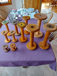 Flameless candles and antique wooden spools