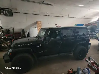 2013 jeep wramgler rubicon. Every option possible, black leather, comes with higher end factory soft...