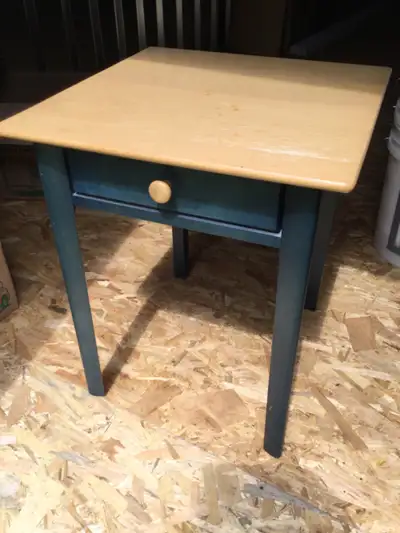 Small hardwood table with drawer. Made in Canada , well constructed. 19” x 19” x 23” high. Makes a g...