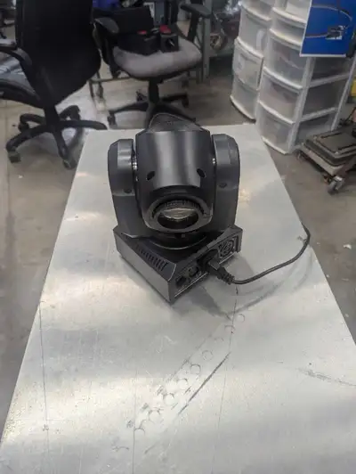 Linkable DJ spotlight. You can link 4 of these together. Has DMX connections. You can put this on au...