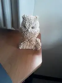 Owl figurine with small shells covering