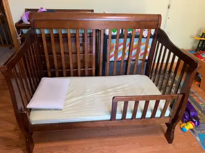 Solid wood crib and change table dresser. Structurally great. Crib converts to a toddler bed (as sho...
