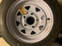 Six low mileage 4.80-12 trailer tires on rims